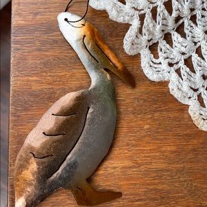 Handcrafted signed dated pelican ornament